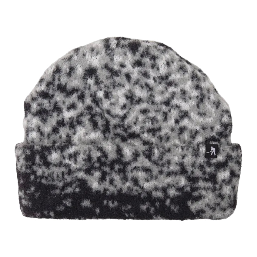 Black and white patterned beanie with a logo on a white background