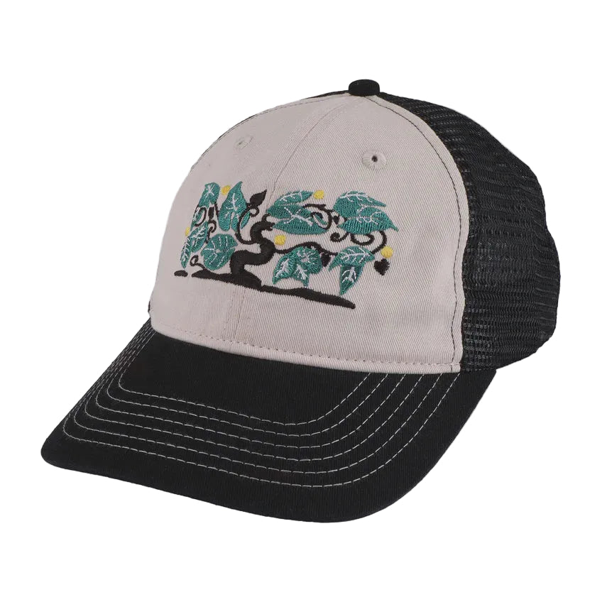 Trucker hat with black and beige design on a white background