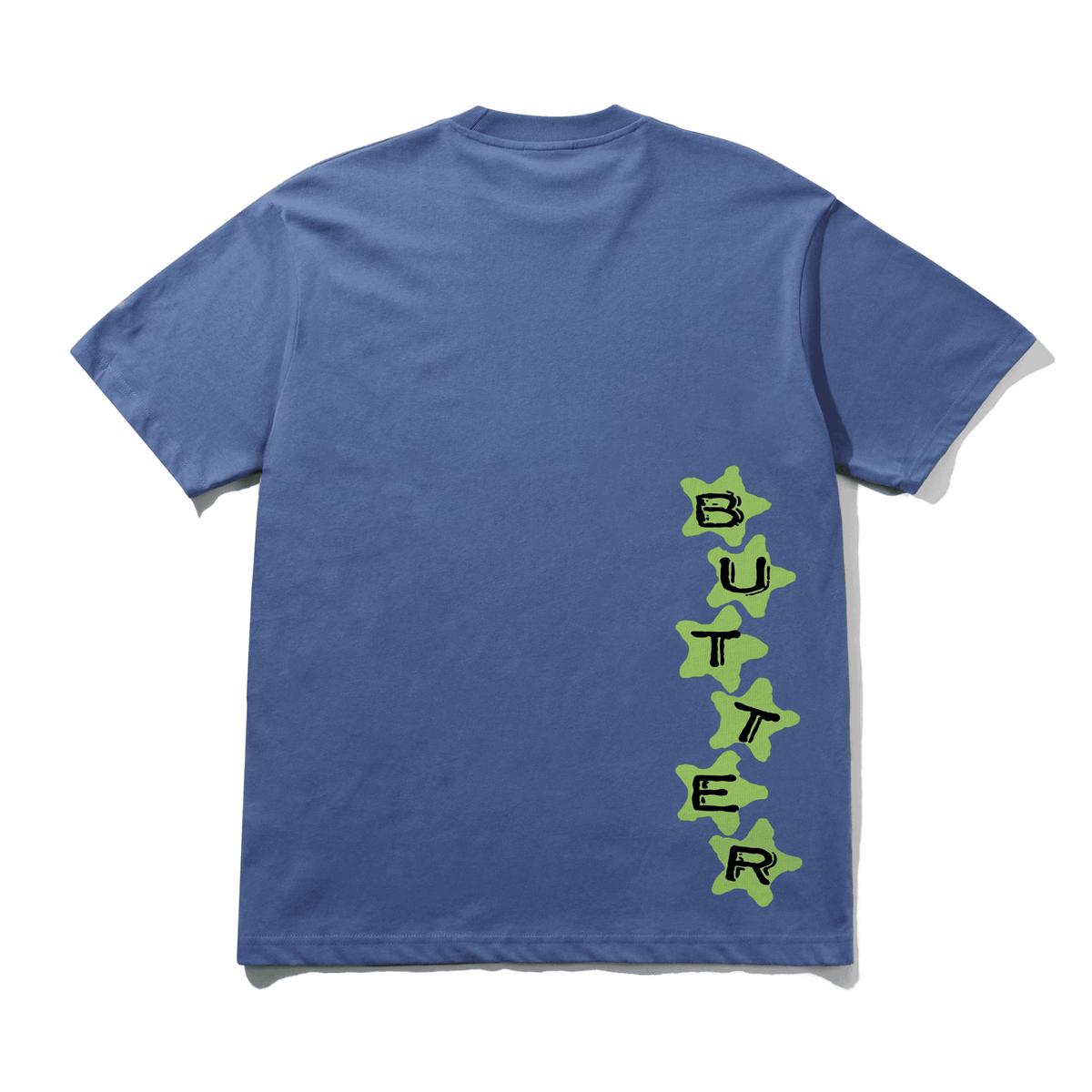 Blue t-shirt with 'BUTTER' printed in green stars on a transparent background
