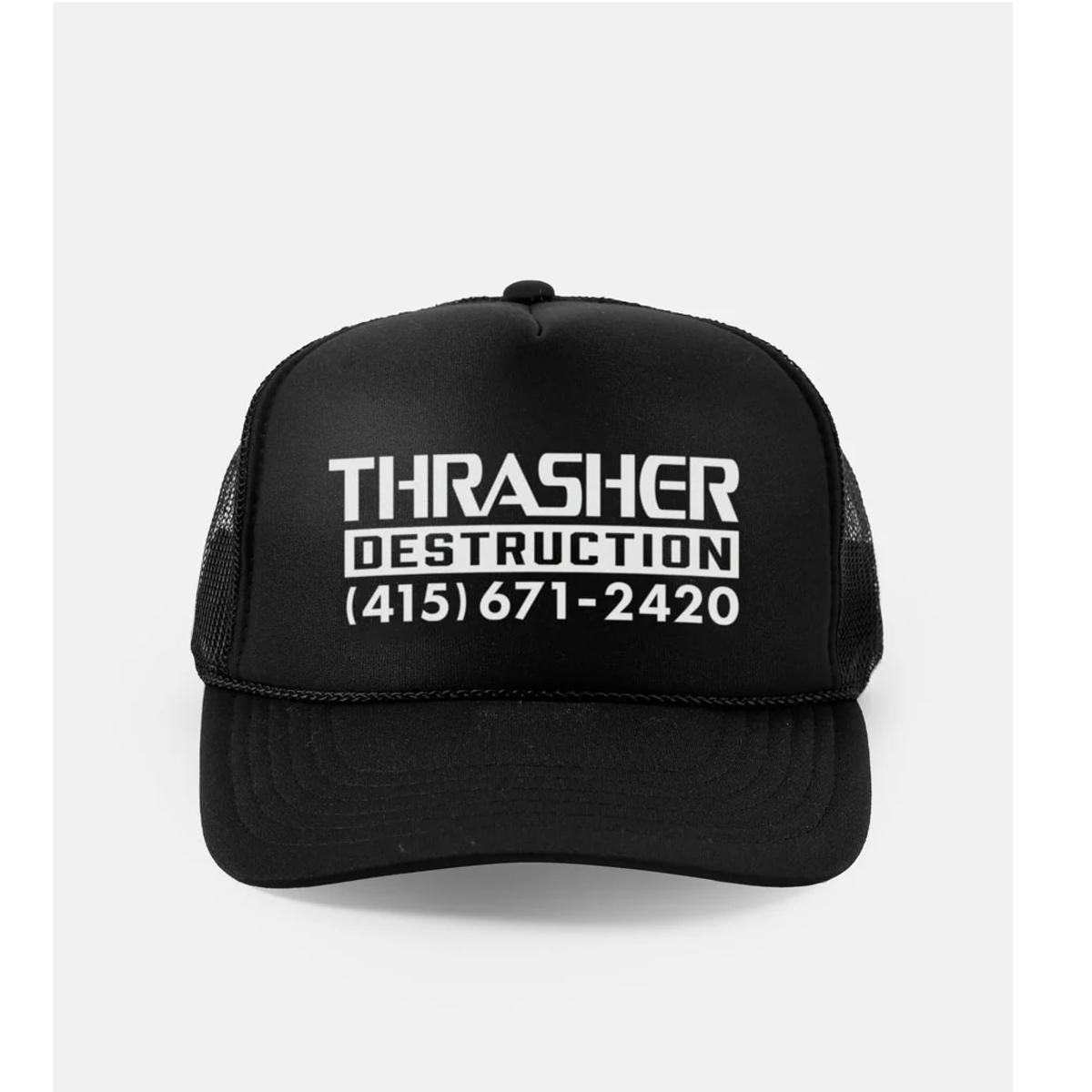 Black trucker cap with white text on a light gray background