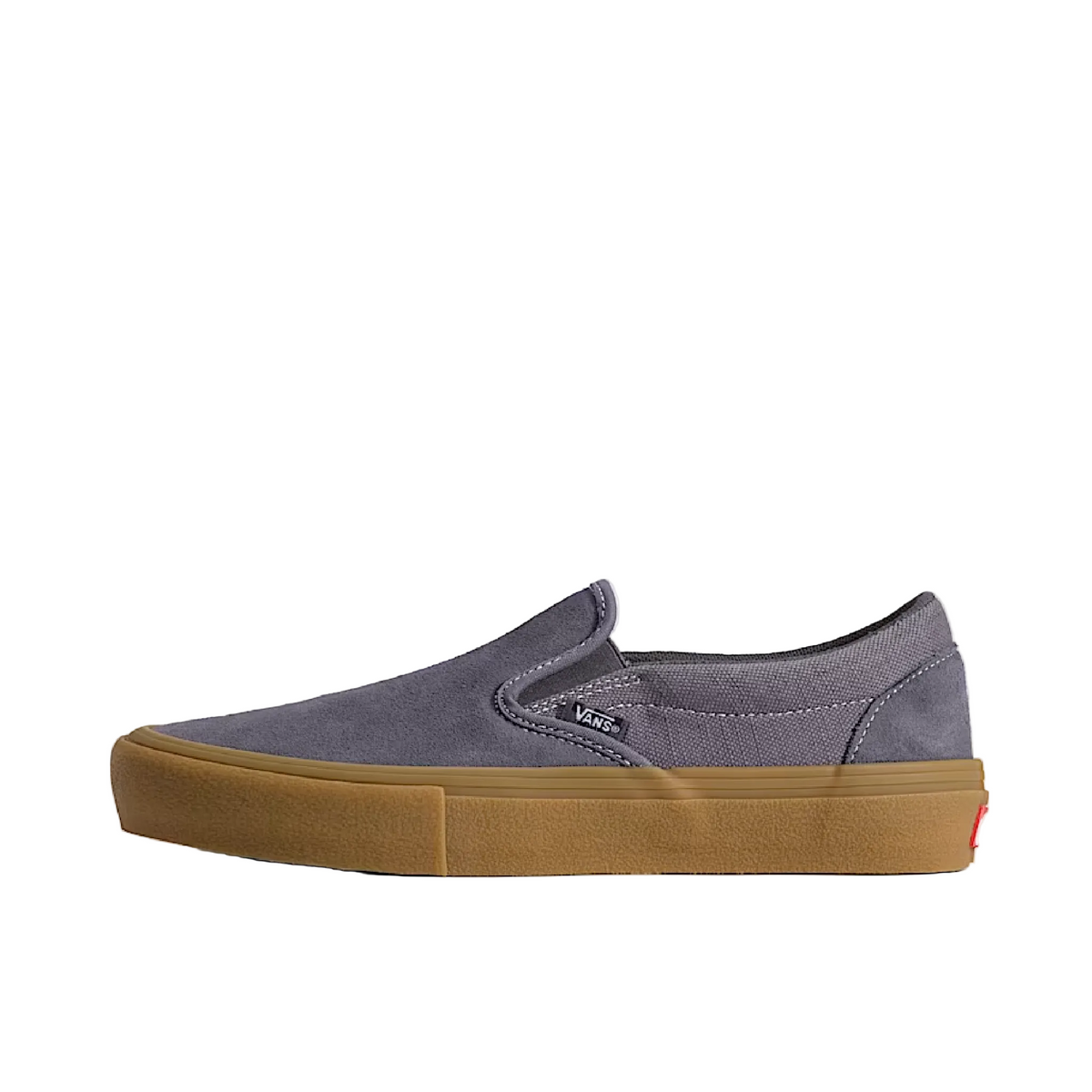 Blue slip-on sneaker with brown sole on a light gray background