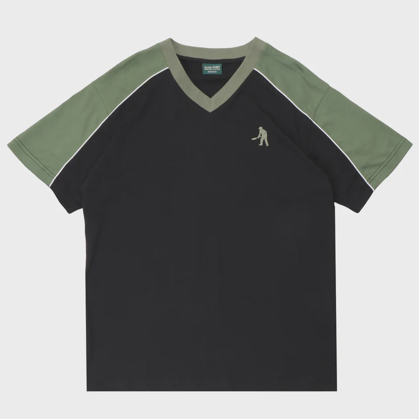 Black t-shirt with green sleeves and collar on a white background