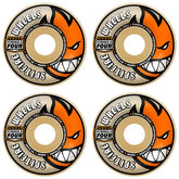 Four skateboard wheels with orange and black design on a white background