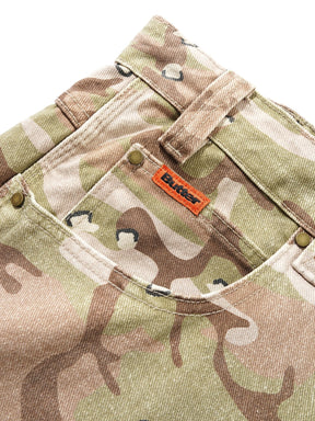 Camouflage pants with an orange brand label on a white background