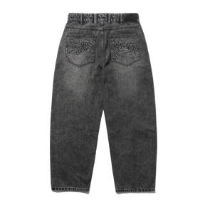 Back view of dark gray acid-wash jeans with embroidered lion designs on the back pockets, shown on a plain white background.