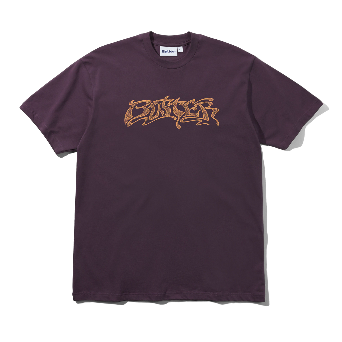 Purple t-shirt with gold logo on a white background