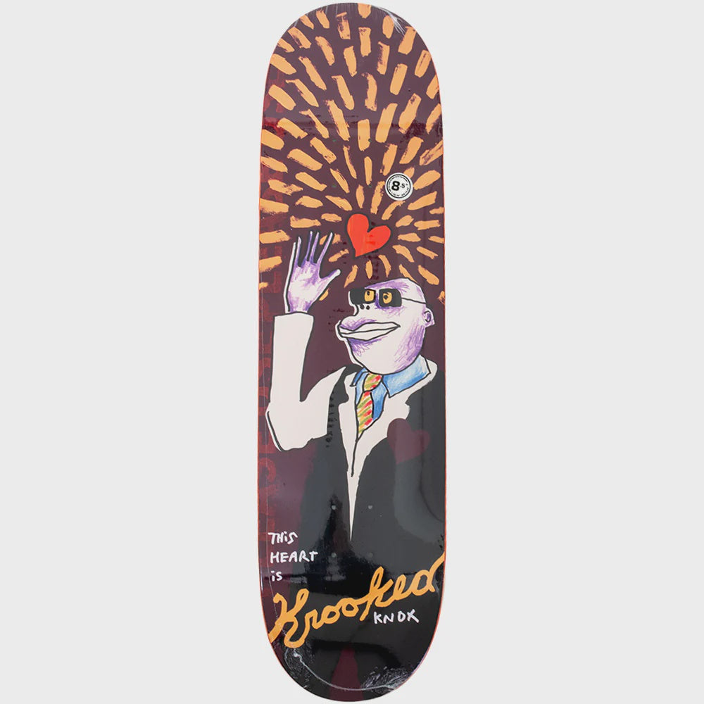 Skateboard deck with a stylized frog character holding a heart and 'Hooked' branding on a white background.