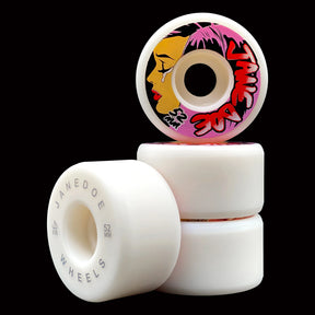 Skateboard wheels with a colorful design on a black background