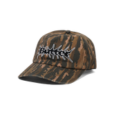 Camouflage-patterned cap with a white logo on a white background