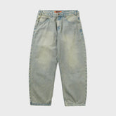 Light blue denim jeans on a white background