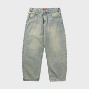 Light blue denim jeans on a white background
