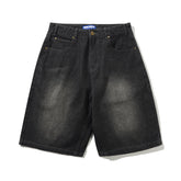 Black denim shorts on a white background