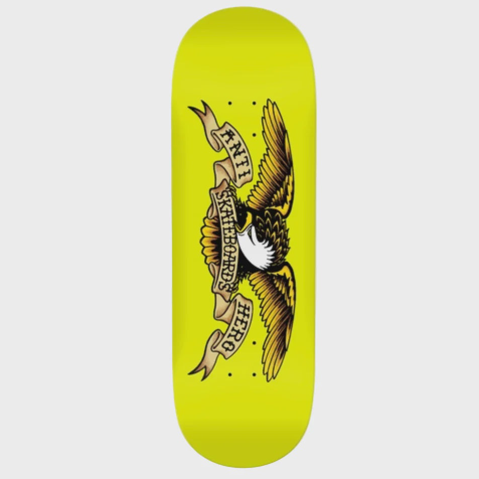 Skateboard deck with eagle design and text on a yellow background