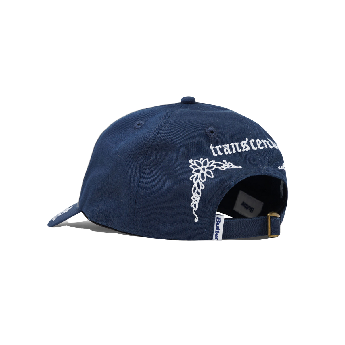 Navy blue cap with white floral design and text on a white background