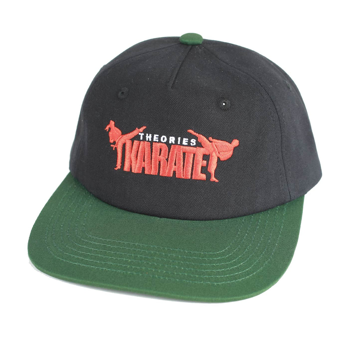 Black and green cap with red text and graphics on a white background