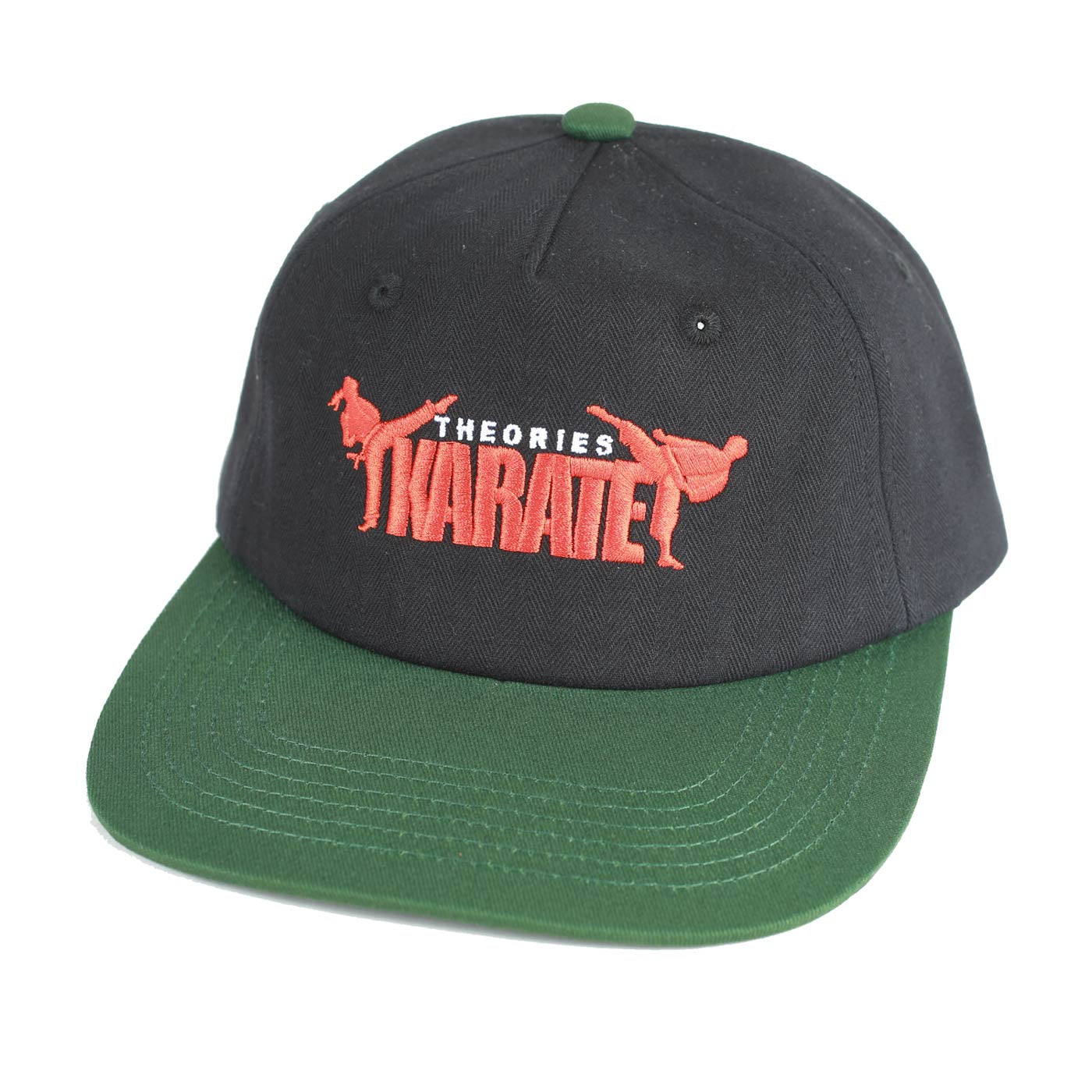 Black and green cap with red text and graphics on a white background