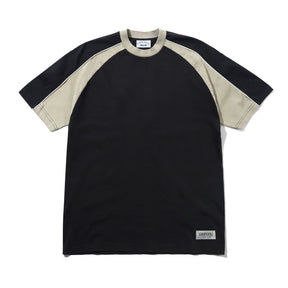 A short-sleeve raglan t-shirt in black and beige, featuring a black body and sleeves with beige shoulder panels and collar trim, laid flat on a white background.