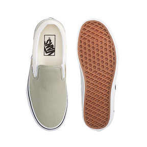 Skechers shoe with a white sole on a light gray background