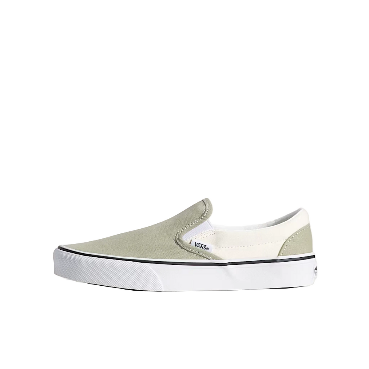 Sole white slip-on sneaker with a light gray toe box on a beige background