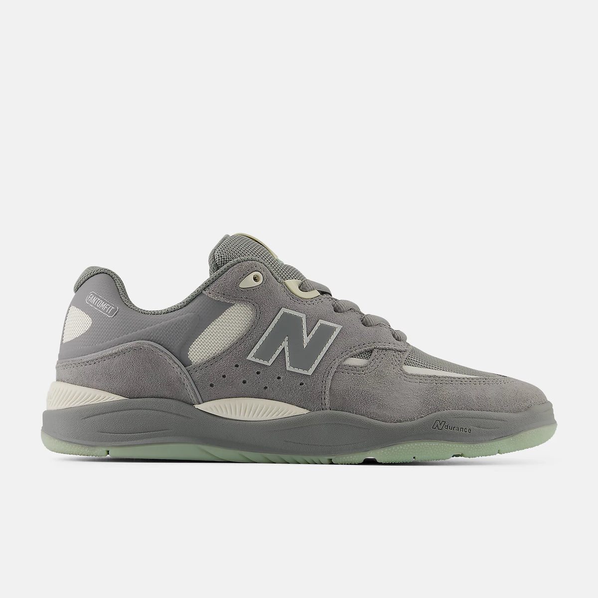 Gray sneaker with New Balance logo on a white background