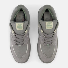 Pair of gray sneakers on a white background