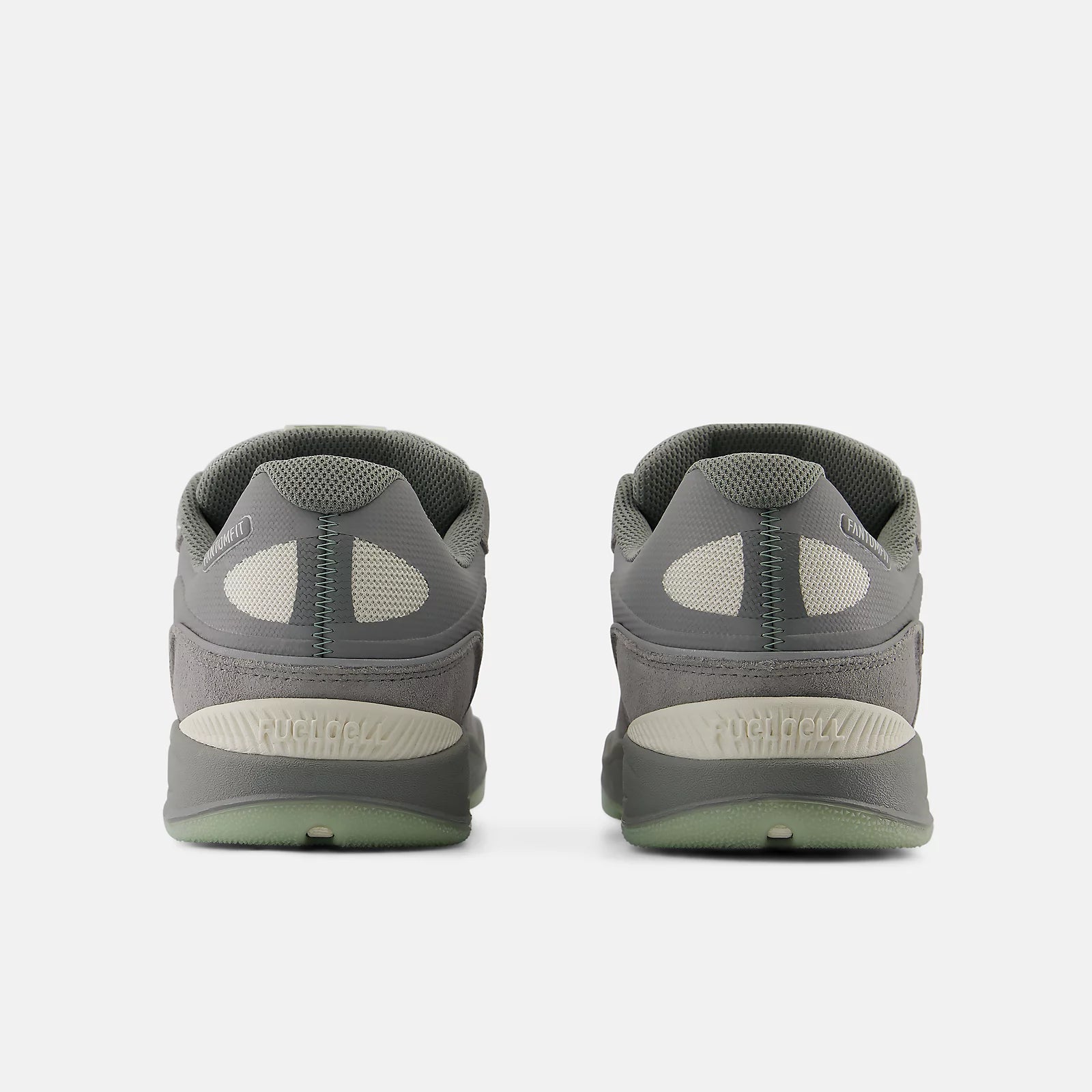 Gray athletic shoes with sole design on a white background