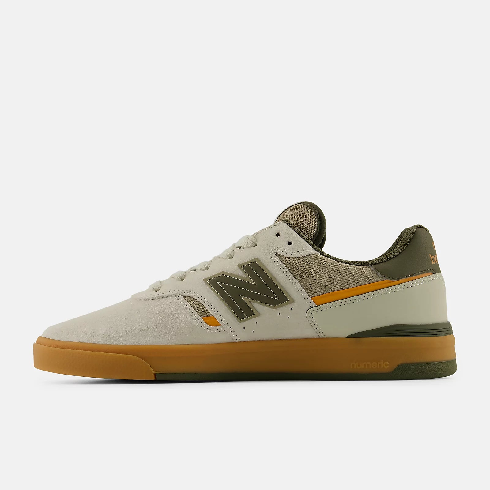 Beige sneaker with brown sole on a white background