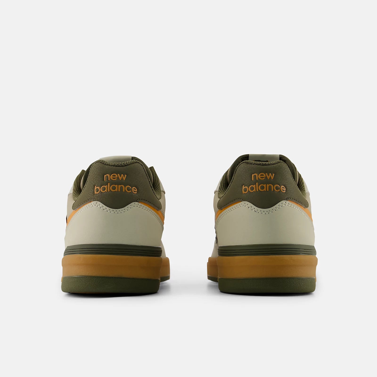 Pair of New Balance sneakers shown from the back on a white background
