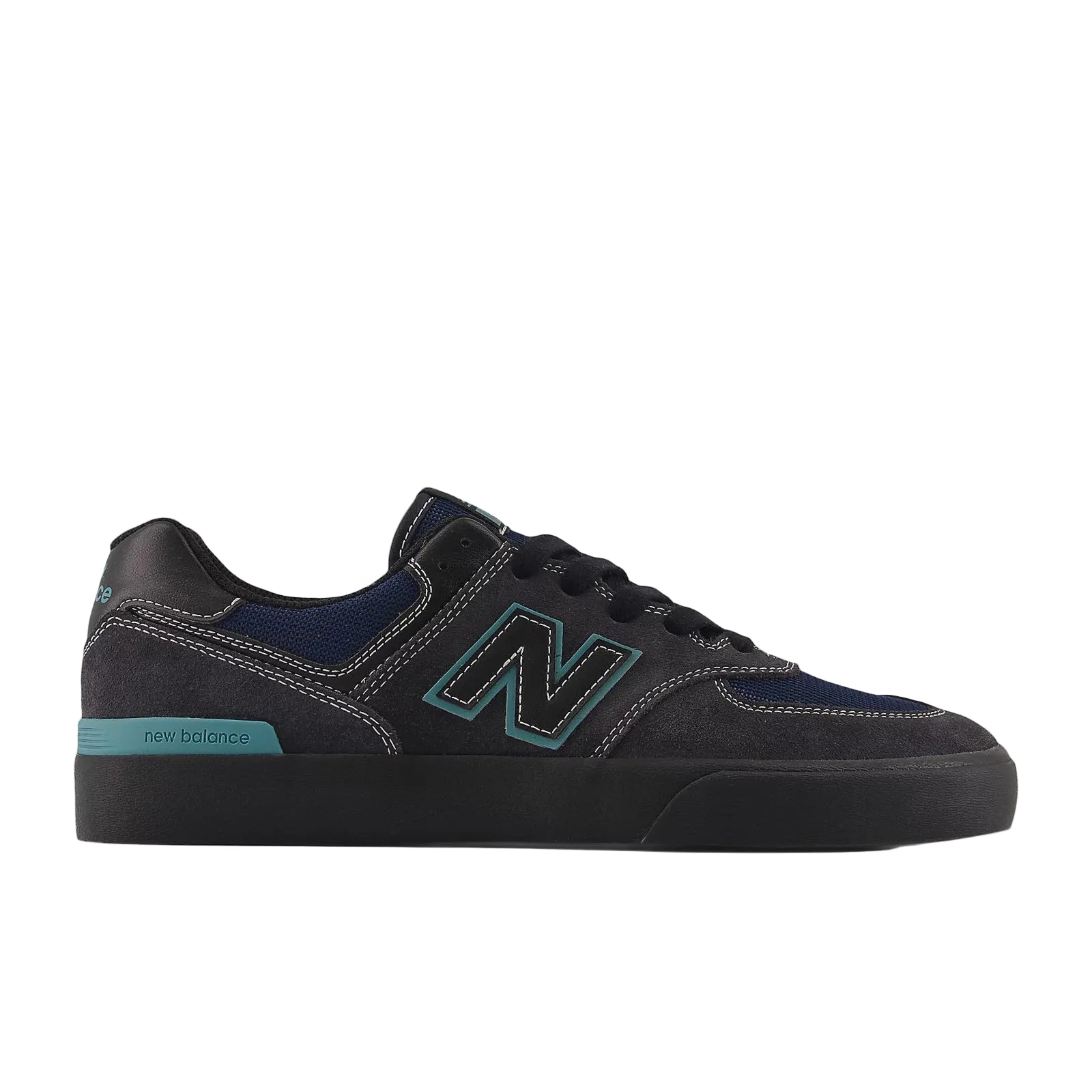 Black sneaker with teal accents on a white background
