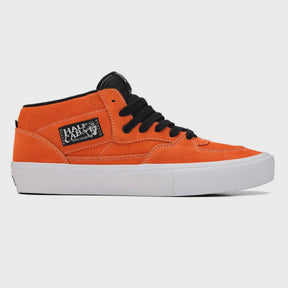 Orange high-top sneaker with black laces on a white background